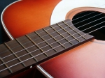 Aprender a tocar guitarra en solo unas horas - 7 estrategias para instruirte en la guitarra.